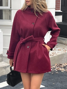 Elegant wine red short wool coat for women featuring a stand collar and tie-waist design