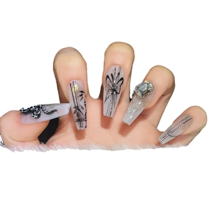 Handmade Y2K press-on nails with black butterfly, snake relief, and ink bamboo patterns