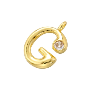 Close-up of 18K gold-plated letter G pendant with an inlaid sparkling crystal stone