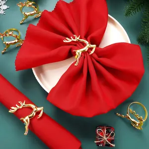 Golden reindeer napkin rings for Christmas table settings and festive dining decor
