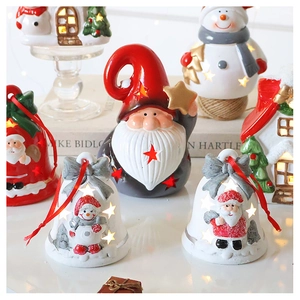 Luminous ceramic Christmas bells and snow house ornaments with warm LED glowing lights