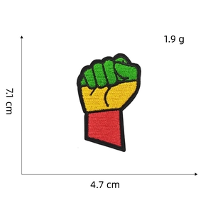 Embroidered fist patch in red yellow green pan-african colors size 7.1x4.7cm