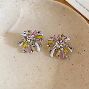 Elegant floral firework stud earrings with colorful enamel and sparkling white crystals