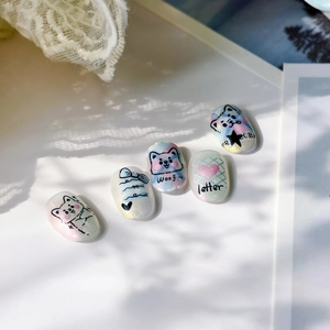 Coffret de faux ongles faits main style japonais avec chiens cartoon et nœuds bleus