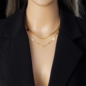 Double-layered golden stainless steel necklace featuring a heart pendant and bead chain