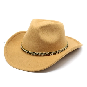 Detail of camel wool felt cowboy hat featuring a black and gold braided decorative band
