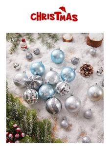 Detail of blue and silver Christmas ball ornaments with snowflake patterns and glitter