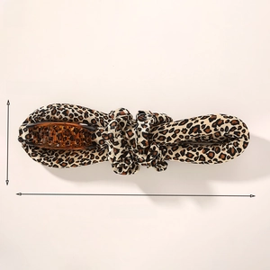 Heatless hair curler set with leopard print showing dimensions 31cm length and 85g weight
