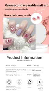 Detailed view of lilac ombre press-on nails with 3D white heart charms and sizing chart