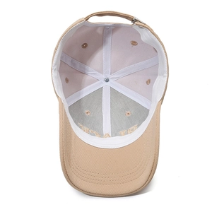 Inside view of khaki baseball cap with letter embroidery and breathable mesh lining