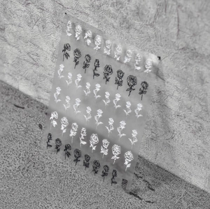 Stickers à ongles 5D motif roses noires et blanches en relief sur feuille transparente