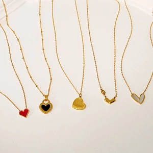 Minimalist titanium steel necklaces with various gold heart-shaped pendants for women