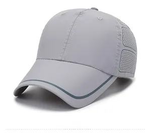 Detailed side view of grey quick-dry baseball cap showing breathable laser-cut holes
