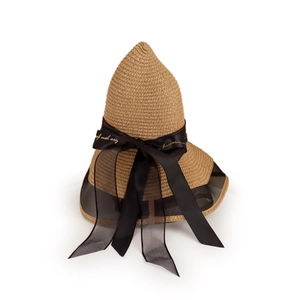Detailed close-up of straw sun hat featuring black mesh brim and elegant ribbon bow