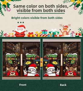 Detailed view of double-sided Christmas static stickers with Santa and elk patterns