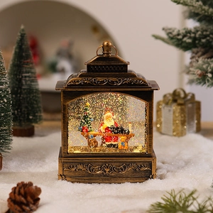 Close-up of vintage bronze Christmas lantern with Santa Claus and glitter snow