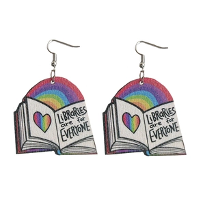 Wooden book earrings featuring a rainbow heart and Libraries are for Everyone slogan