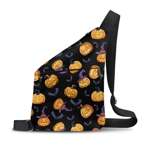 Detailed close-up of Halloween pumpkin and bat print on black crossbody shoulder bag
