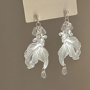 Silver Koi fish drop earrings with hollow metal design and clear teardrop beads