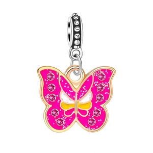 Detail of pink butterfly pendant charm with gold plating and rose pink crystals