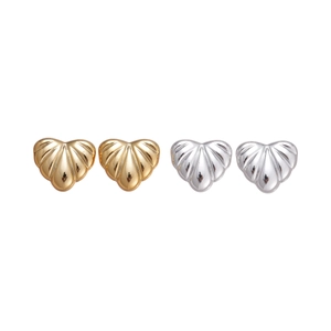 Minimalist textured heart stud earrings in gold and silver finish on white background