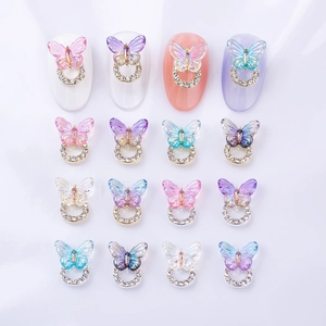 3D aurora butterfly nail charms with rhinestone rings in various shimmering colors