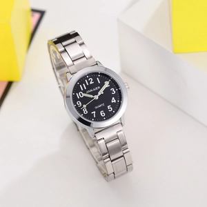 Children's quartz watch with silver steel strap, black dial, and glowing hands