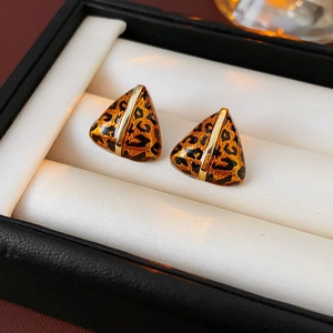 Vintage leopard print triangle earrings with gold metal frame in a gift box