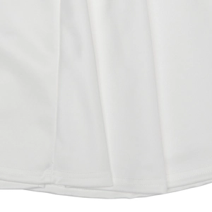 Detail shot of hem stitching and pleated texture on white sleeveless mini dress