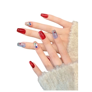 Christmas cat eye press-on nails with red glitter, cherry charms and rhinestones