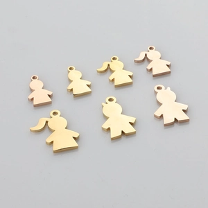Detailed view of polished gold and rose gold boy and girl silhouette charms