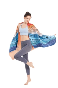 Bohemian microfiber beach towel featuring vibrant geometric patterns and lightweight texture