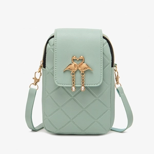 Mint green quilted leather crossbody phone bag with golden flamingo heart closure