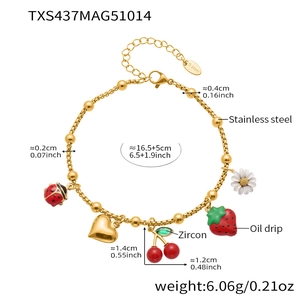 Detailed view of golden stainless steel bracelet with zircon charms and size annotations