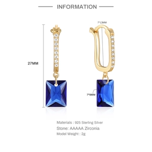 Detailed view of S925 sterling silver U-shaped earring with blue zirconia pendant