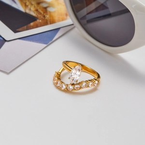 Detail of 18K gold-plated double-layer ring featuring a marquise-cut zircon and accents