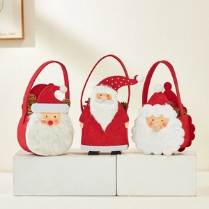 Three felt Christmas reindeer and Santa gift bags displayed on a clean white pedestal