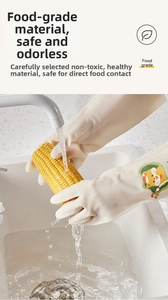 Close-up of food-grade rubber gloves with cartoon tiger pattern for safe kitchen cleaning