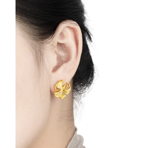 Elegant gold S925 silver ginkgo leaf stud earrings with diamonds on ear model