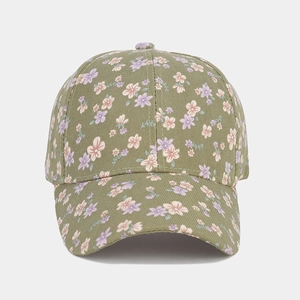 Detailed front view of olive green floral baseball cap with pink flower print