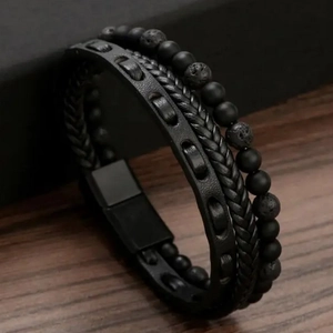 Men's punk leather multilayer bracelet with black beads and tiger eye stone on wood