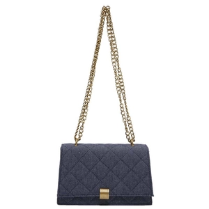 Deep blue denim quilted crossbody bag with gold chain strap and rectangular lock