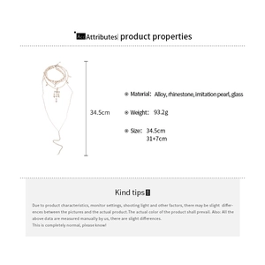 Detailed specs of double layer cross and pearl pendant necklace with rhinestone weights