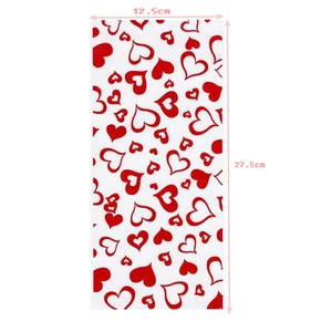 Clear dimensions 12.5x27.5cm for white candy gift bag with red heart pattern print