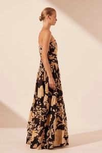 Side view of elegant strapless floral maxi dress with layered skirt for summer vacation