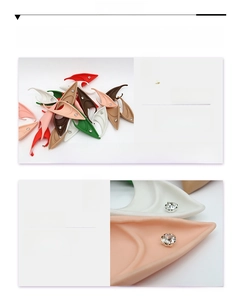 Detail of latex elf ears with glitter gemstones in multiple colors for cosplay