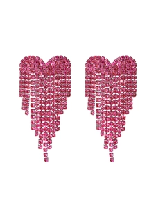 Close-up of pink rhinestone heart tassel earrings with long vertical fringe details