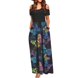 Detail of cold-shoulder neckline and colorful butterfly print on black maxi dress