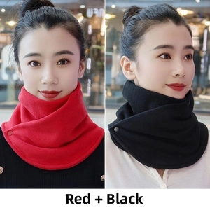 Detail of soft fleece neck warmer with button closure in red and black colors