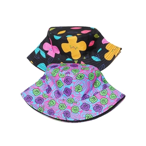 Hip hop bucket hats with vibrant floral and melting smiley face patterns on white background